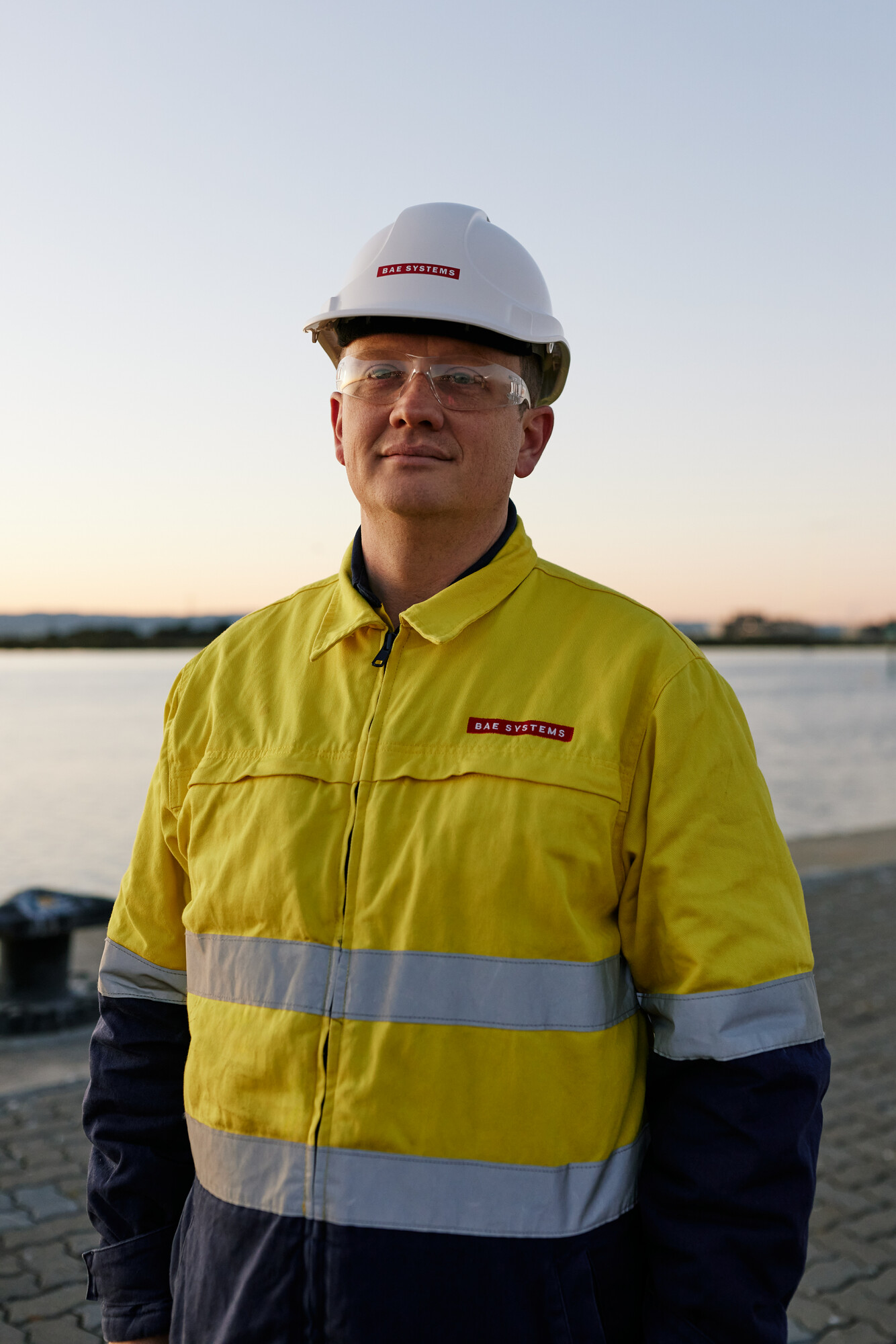 Man in high visbility gear with helmet
