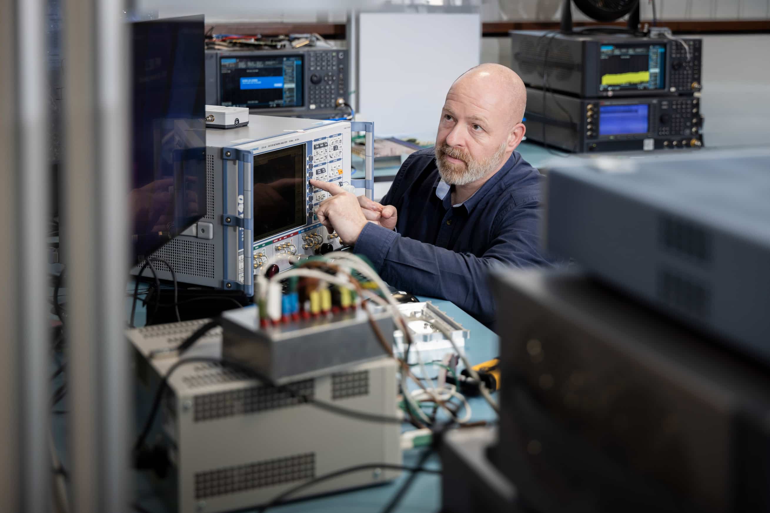 Employee using complex sensor equiptment