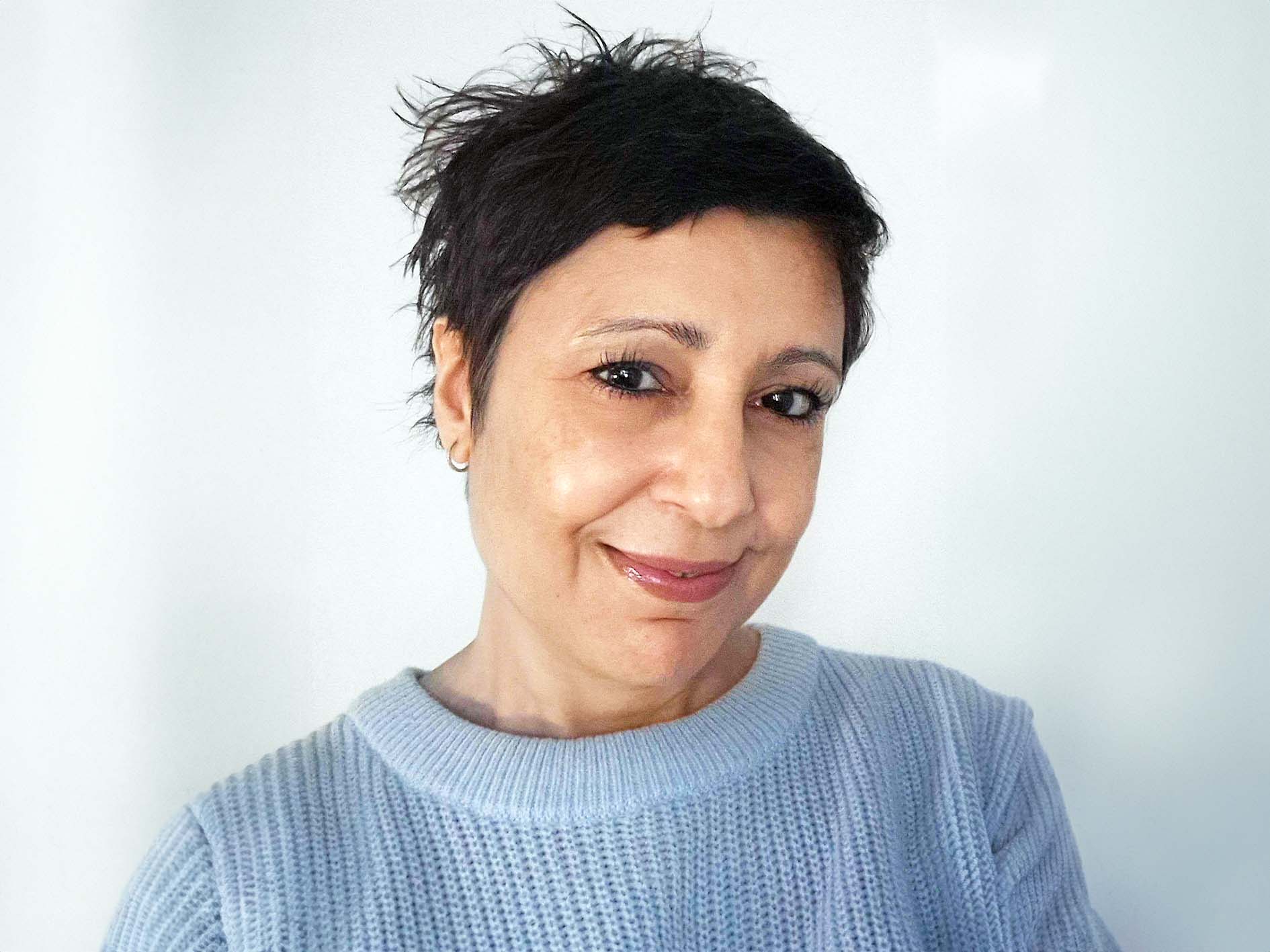 Woman with short hair smiling
