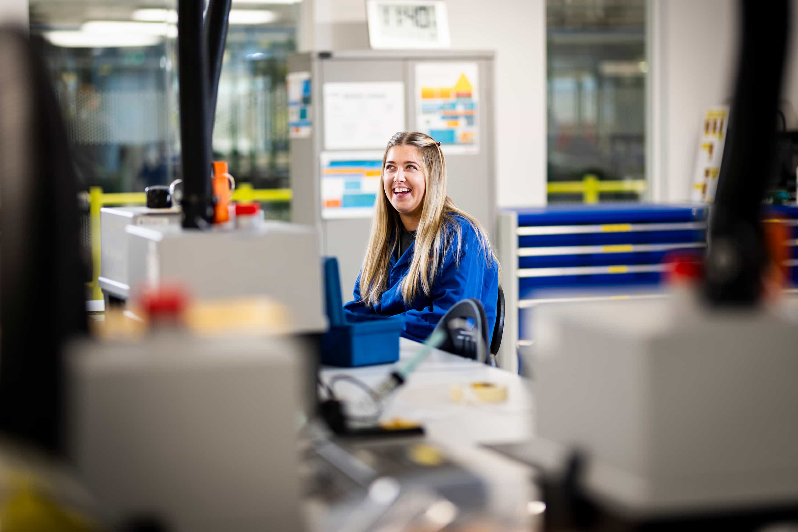 Smiling employee in workshop