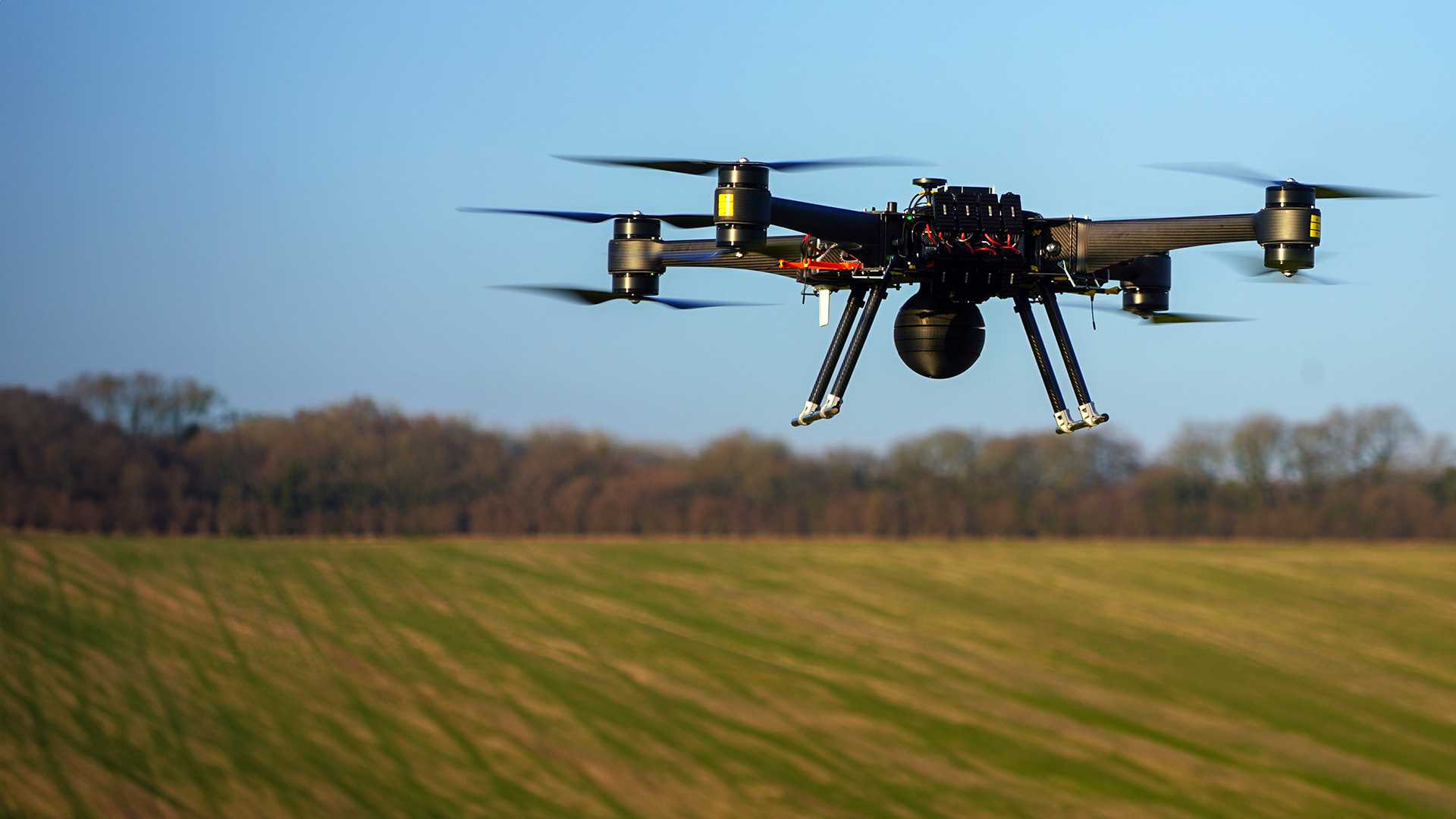 A drone in flight viewed from below